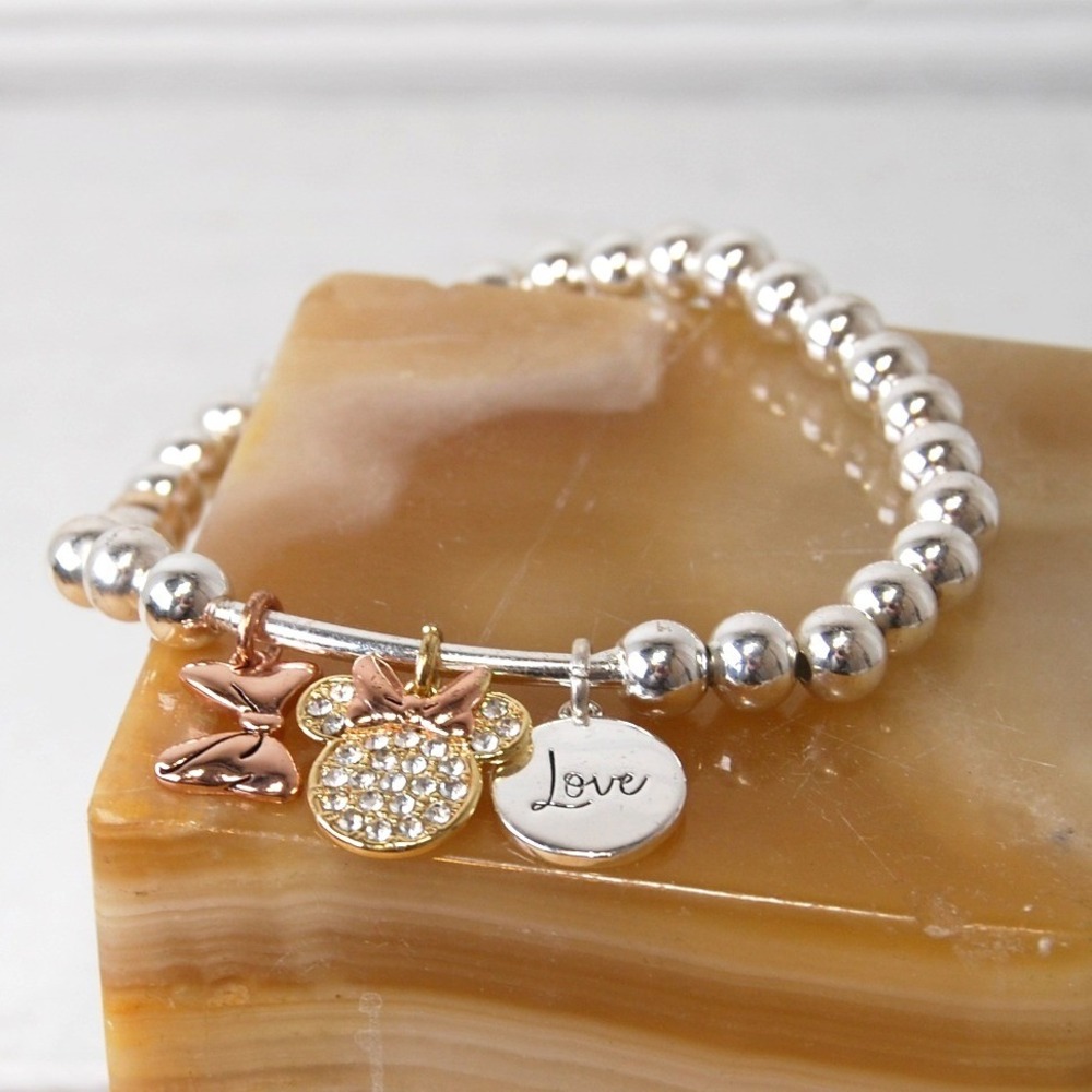 Disney's Minnie Mouse Bracelet "Love Is Bowtiful" Silver-Plate Charm Stretch